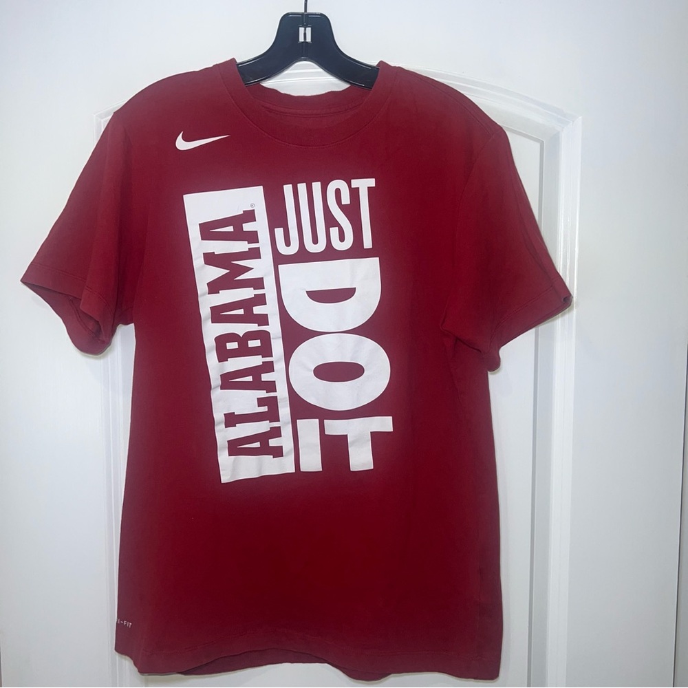 The NIKE Tee Unisex Alabama Just Do It Dri-Fit T-Shirt. Size Medium